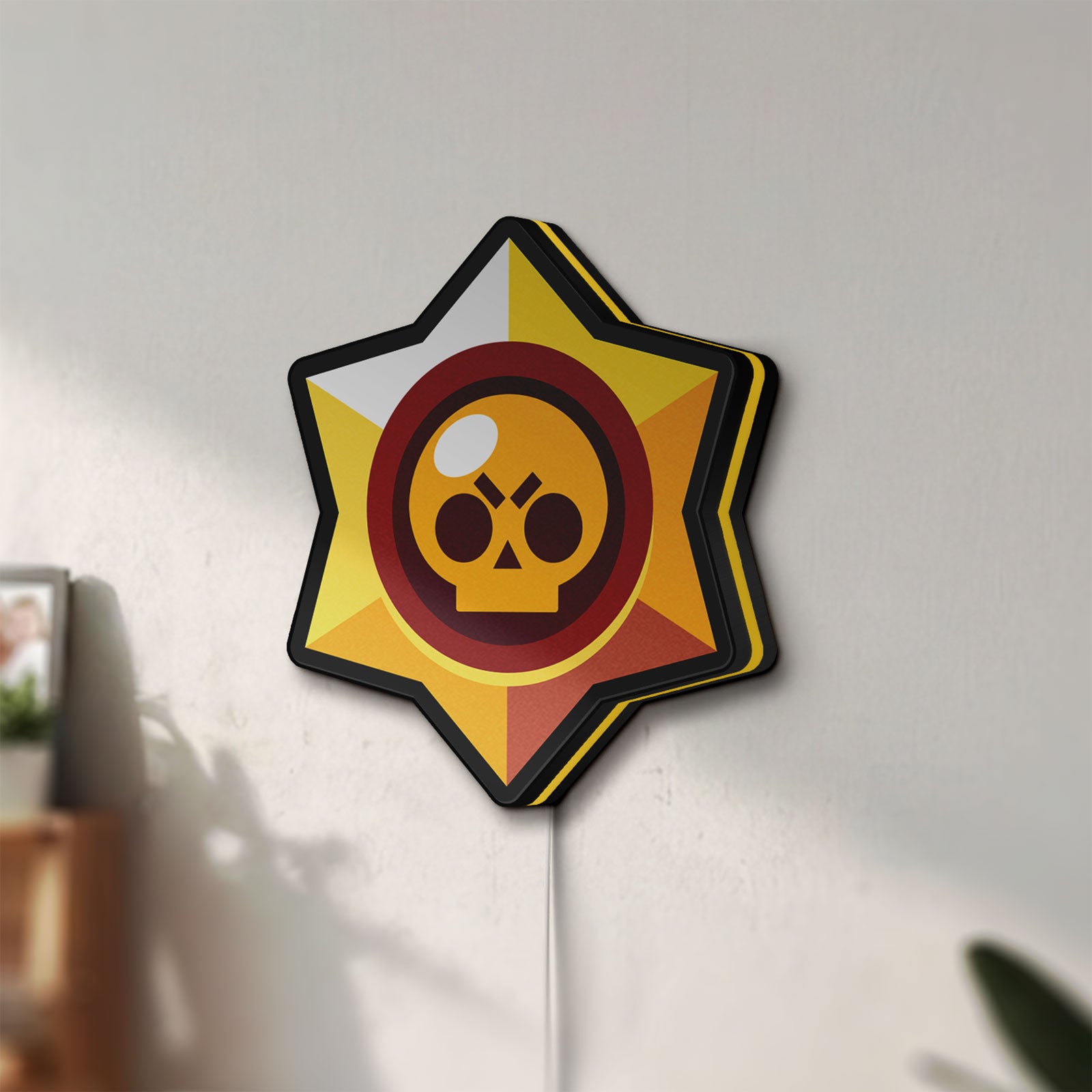 Unlit Brawl Stars LED lightbox mounted on a wall in daylight