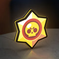Brawl Stars LED lightbox standing on a desk from an angled side view with yellow glow