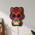 Unlit L.O.L Surprise Cat LED lightbox mounted on a wall in daylight