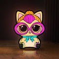 Front view of L.O.L Surprise Cat LED lightbox sign glowing on a wooden desk