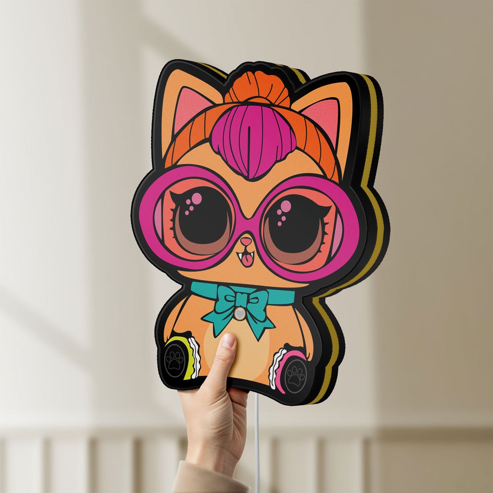 Unlit L.O.L Surprise Cat LED lightbox held by hand to show size and details