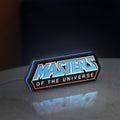 Masters of the Universe LED lightbox standing on a desk from an angled side view with blue glow