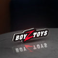 Boyztoys Racing LED lightbox standing on a desk from an angled side view with white glow