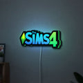 The Sims 4 Plumbob LED lightbox hanging on a wall with green glow