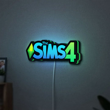 The Sims 4 Plumbob LED lightbox hanging on a wall with green glow