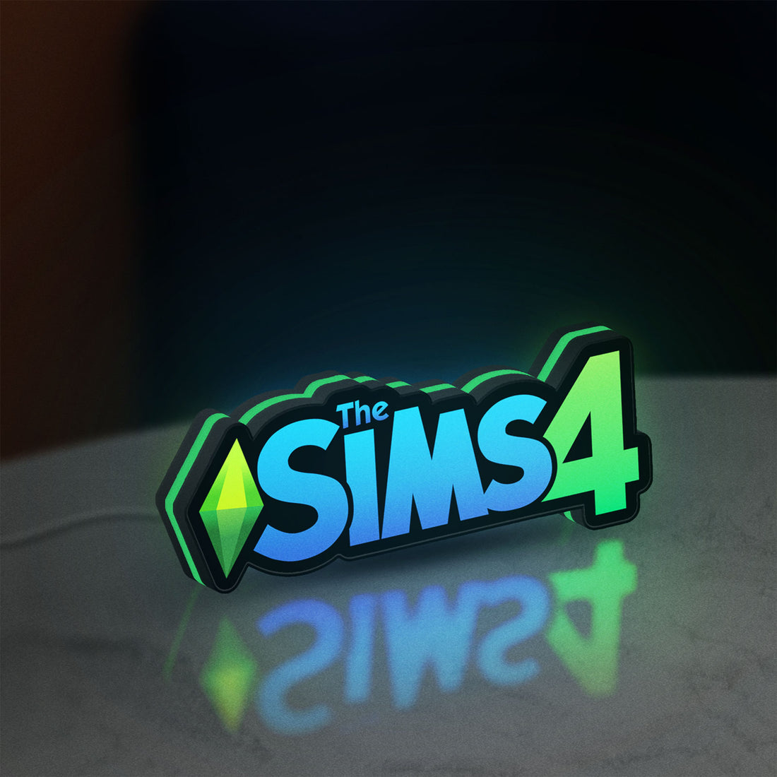 The Sims 4 Plumbob LED lightbox hanging on a wall with green glow