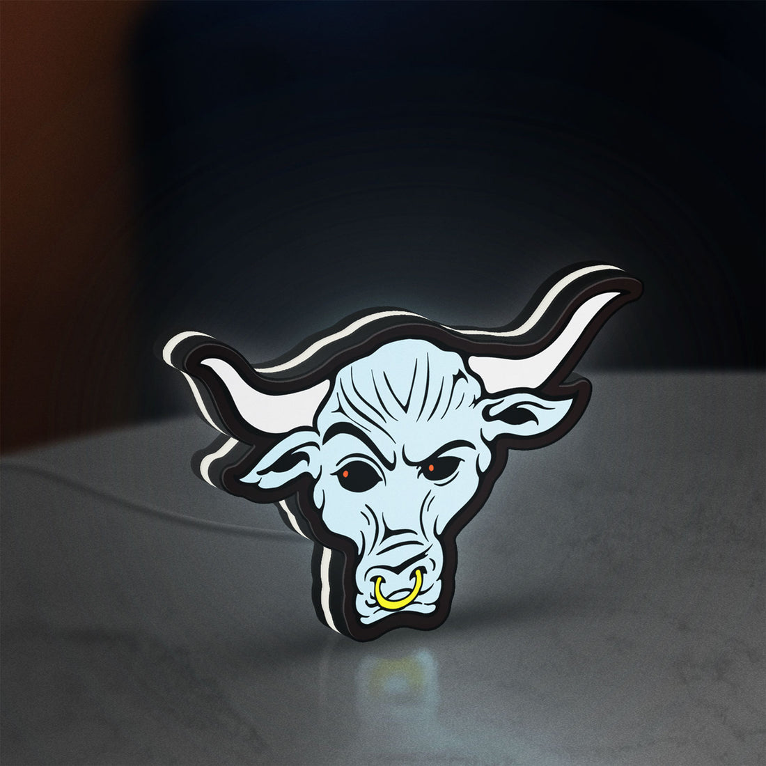 WWE Brahma Bull LED lightbox hanging on a wall with white glow