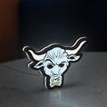 WWE Brahma Bull LED lightbox standing on a desk from an angled side view with white glow