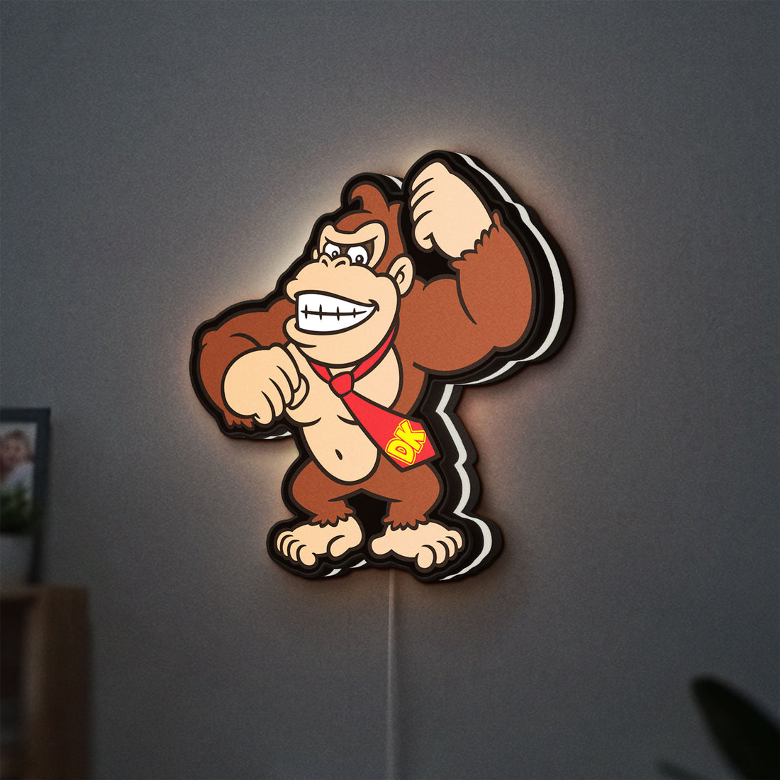 Donkey Kong LED lightbox hanging on a wall with white glow