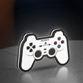 Sony PlayStation Pad LED lightbox standing on a desk from an angled side view with white glow