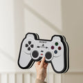 Unlit Sony PlayStation Pad LED lightbox held by hand to show size and details