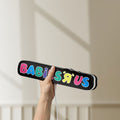Unlit Babies R Us LED lightbox held by hand to show size and details
