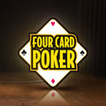 Front view of Four Card Poker LED lightbox sign glowing on a wooden desk