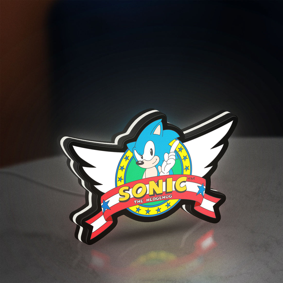 Sonic the Hedgehog LED lightbox hanging on a wall with white glow