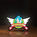 Front view of Sonic the Hedgehog LED lightbox sign glowing on a wooden desk