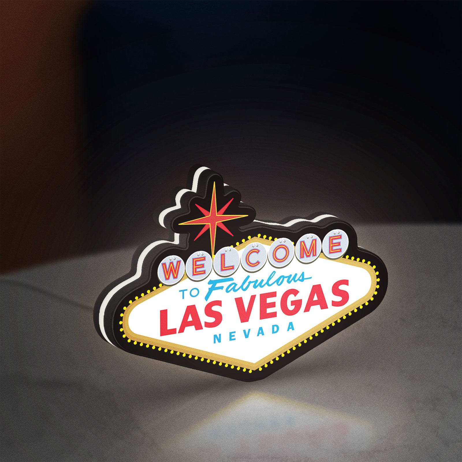 Las Vegas Nevada LED lightbox standing on a desk from an angled side view with white glow