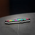 Toys R Us LED lightbox lying flat on a desk with white glow