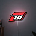Forza Motorsport 3 LED lightbox hanging on a wall with red glow