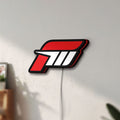 Unlit Forza Motorsport 3 LED lightbox mounted on a wall in daylight
