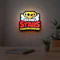Brawl Stars Championship Lightbox LED lightbox hanging on a room wall with soft yellow light