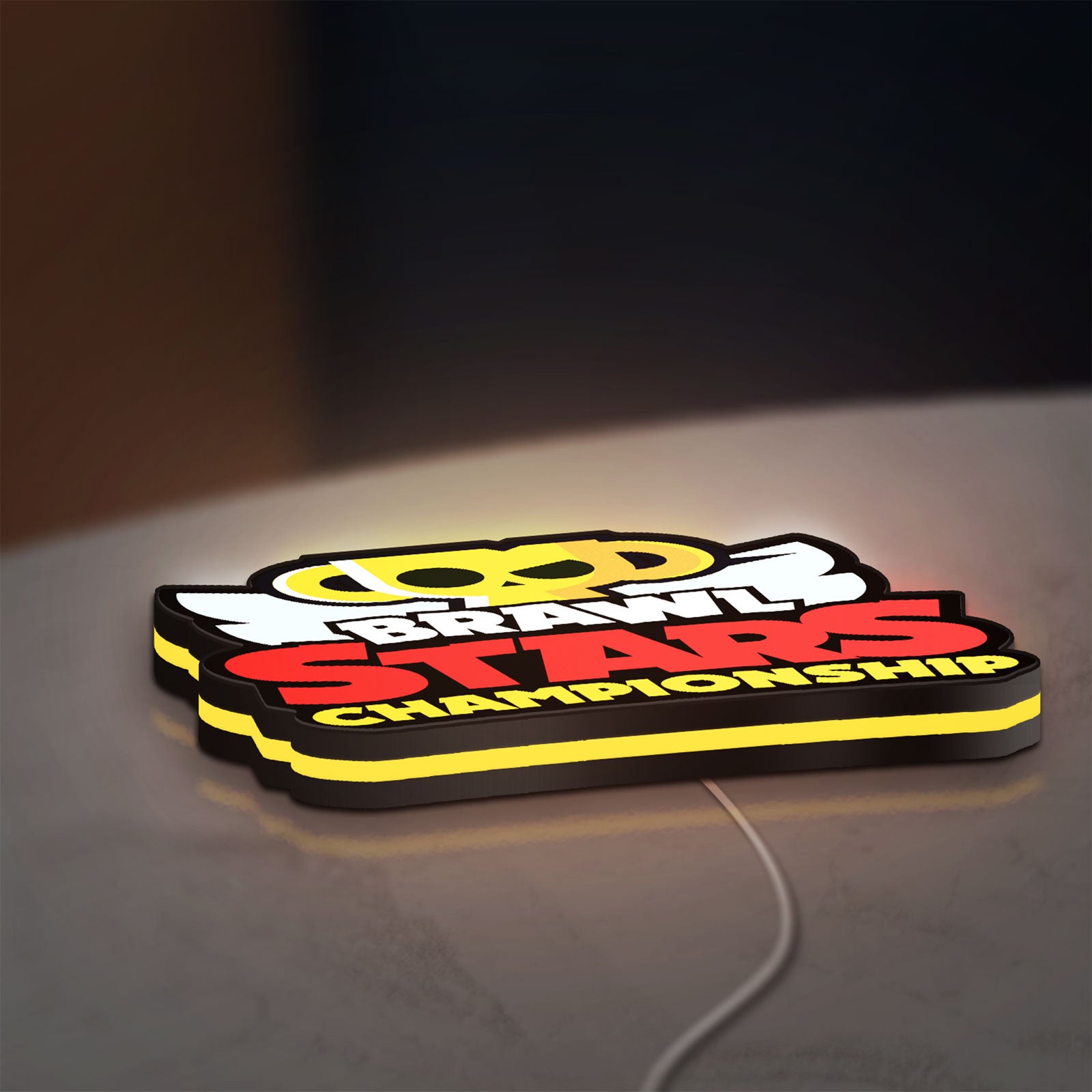 Brawl Stars Championship Lightbox LED lightbox lying flat on a desk with yellow glow