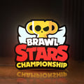 Front view of Brawl Stars Championship Lightbox LED lightbox sign glowing on a wooden desk