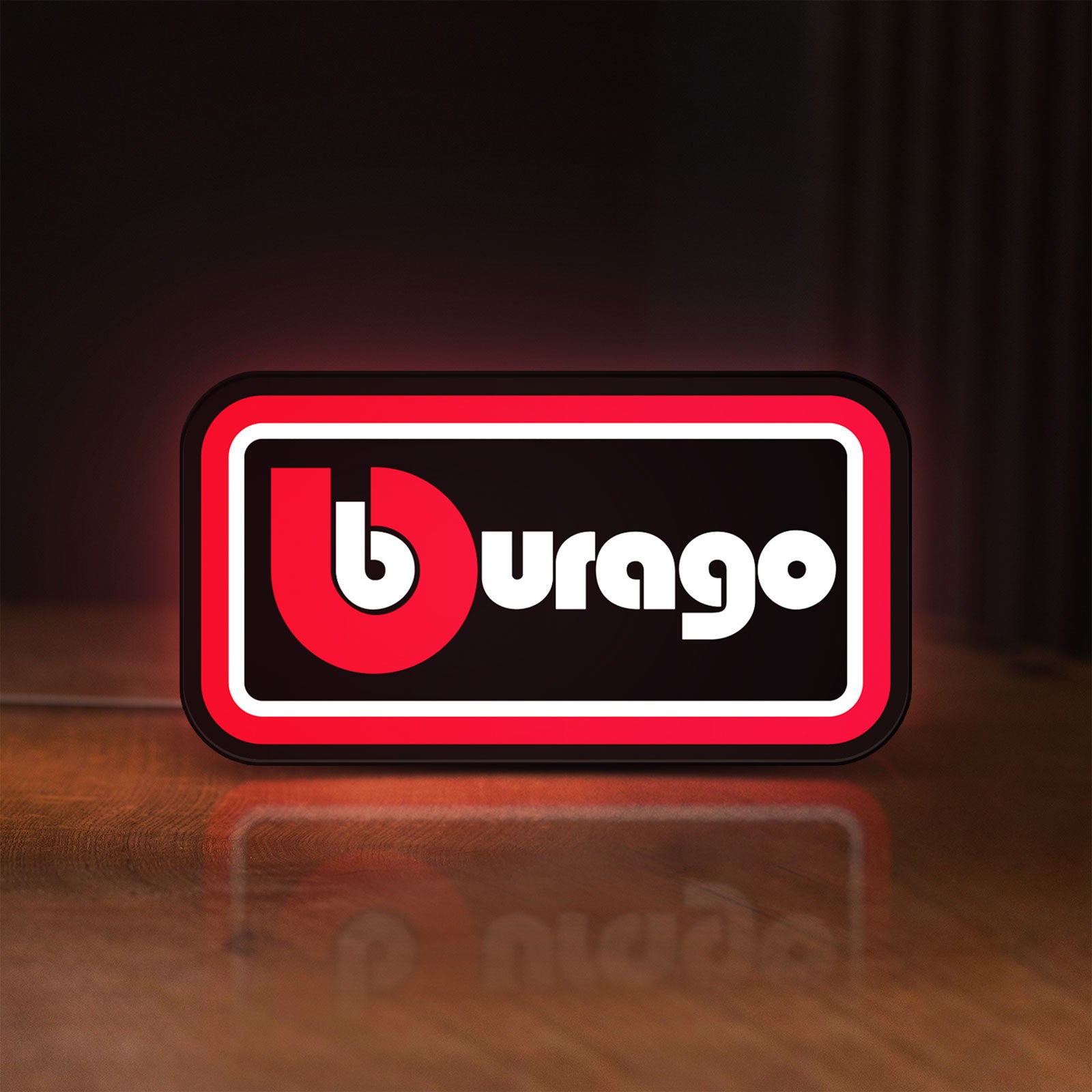 Front view of Bburago LED lightbox sign glowing on a wooden desk