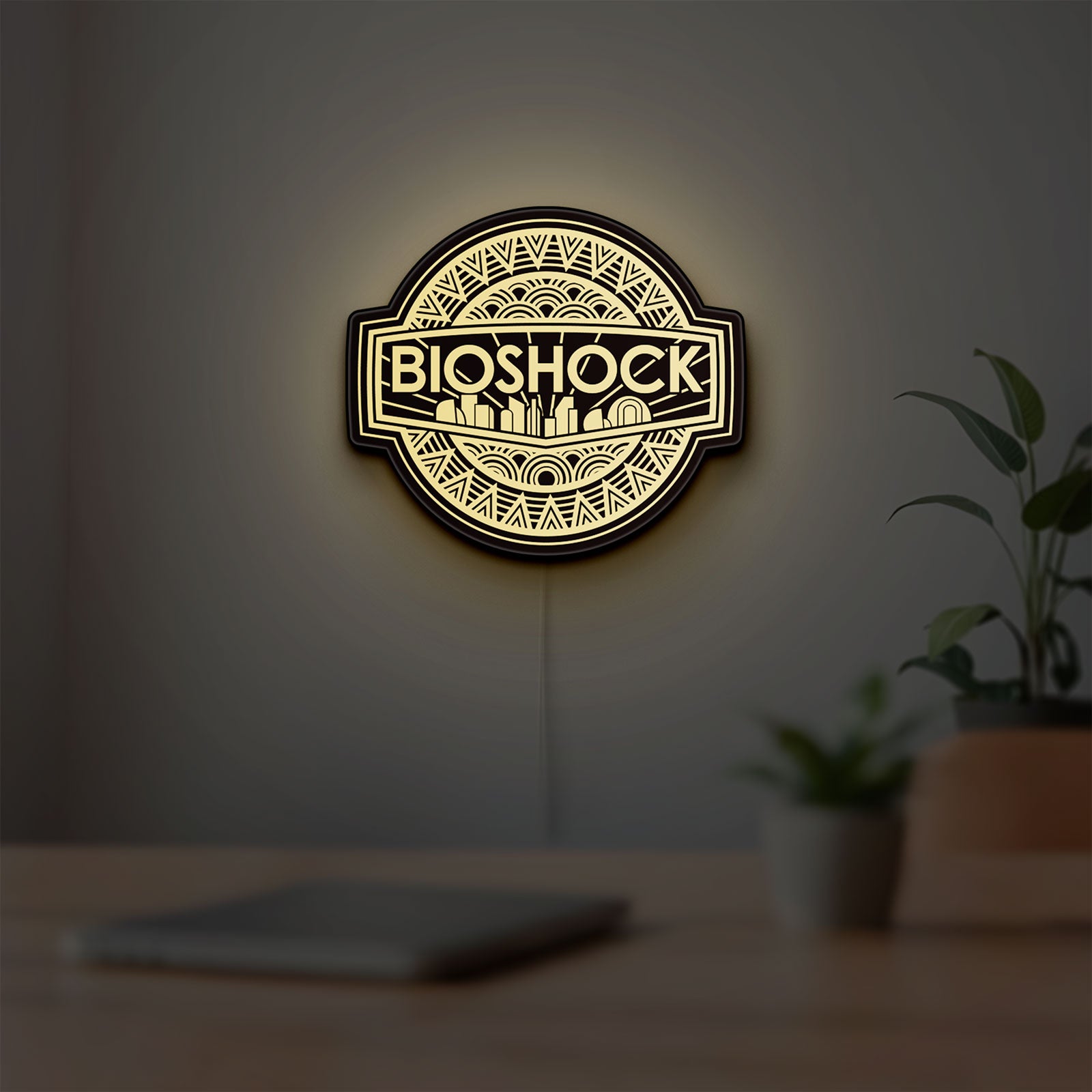 BioShock Rapture City LED lightbox hanging on a room wall with soft yellow light