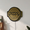 Unlit BioShock Rapture City LED lightbox mounted on a wall in daylight