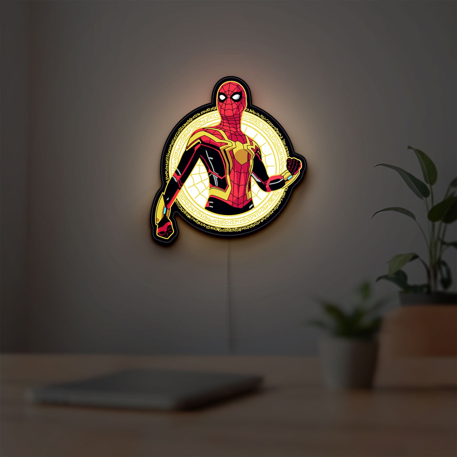 Spiderman LED lightbox hanging on a room wall with soft yellow light