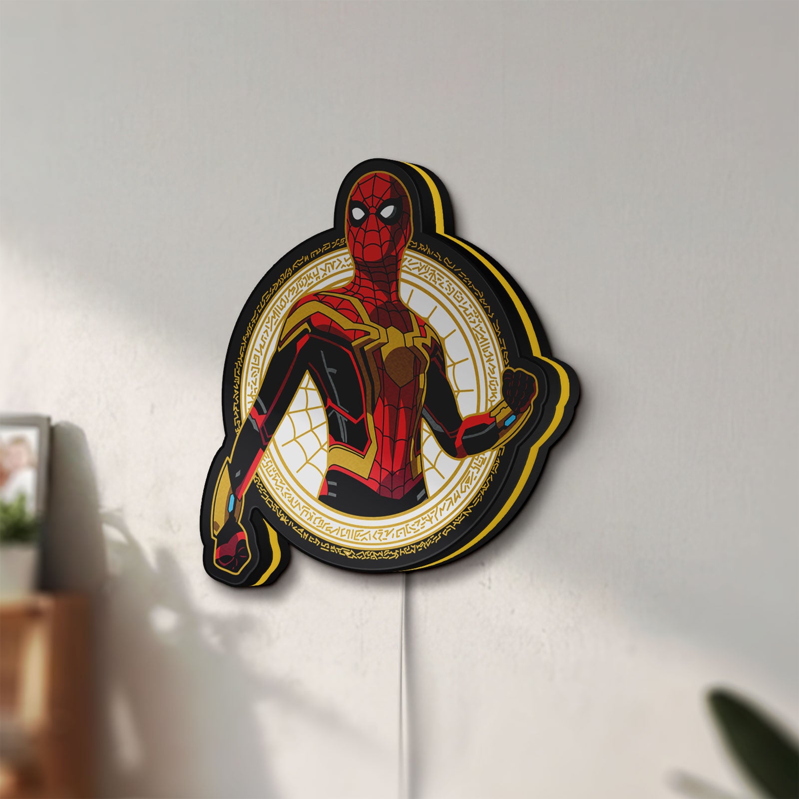 Unlit Spiderman LED lightbox mounted on a wall in daylight