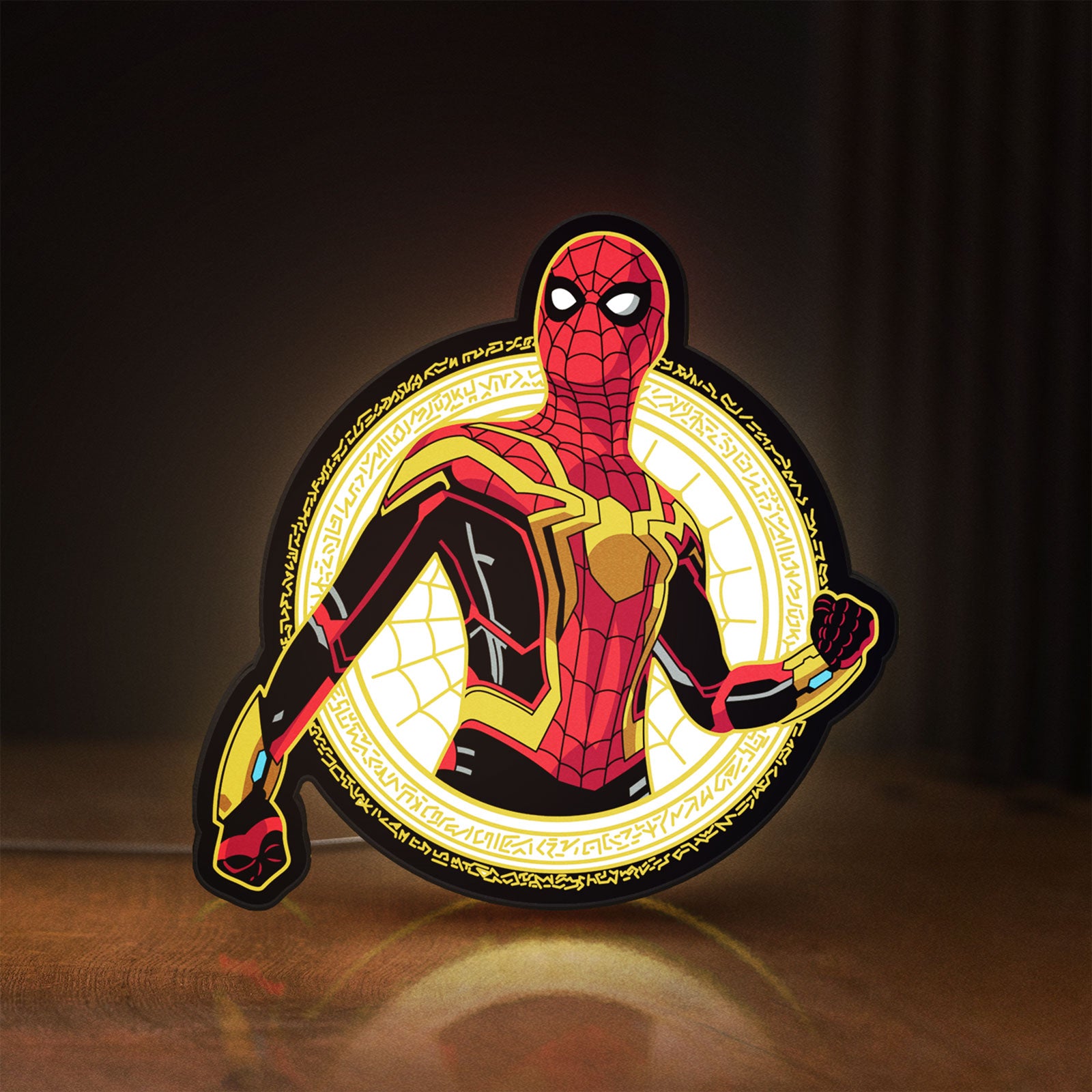 Front view of Spiderman LED lightbox sign glowing on a wooden desk