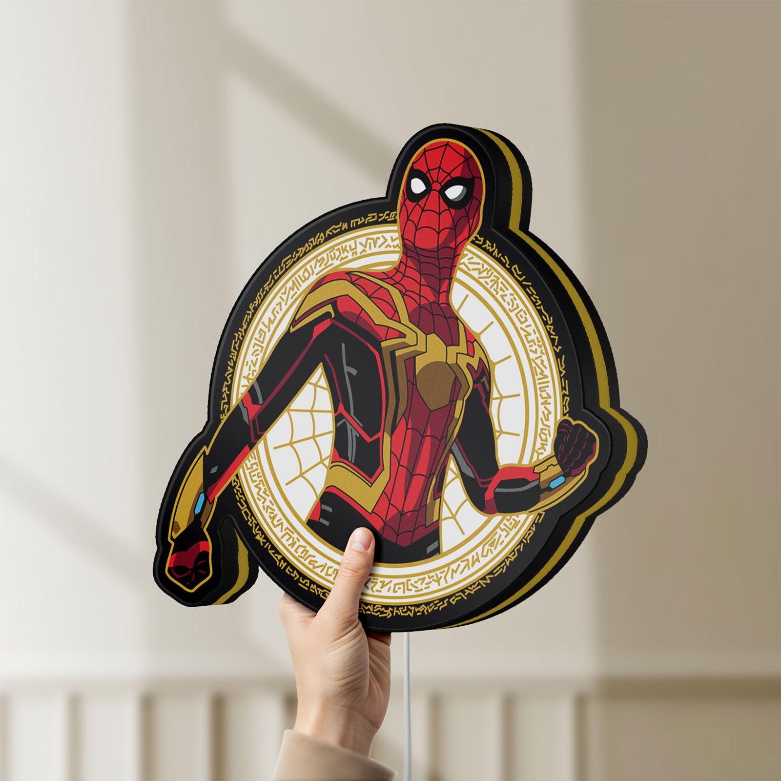 Unlit Spiderman LED lightbox held by hand to show size and details