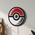 Unlit Pokémon Pokéball Legue LED lightbox mounted on a wall in daylight