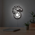 Shadowrun LED lightbox hanging on a room wall with soft white light