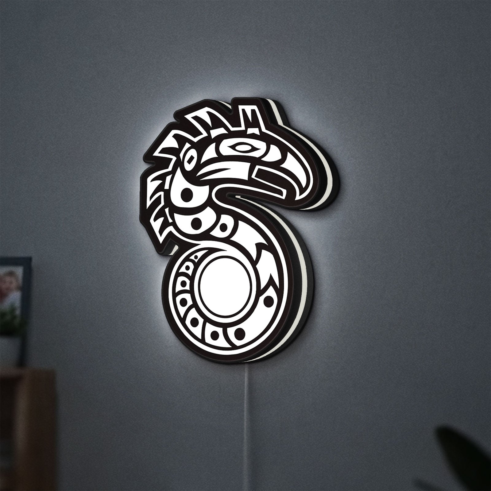 Shadowrun LED lightbox hanging on a wall with white glow