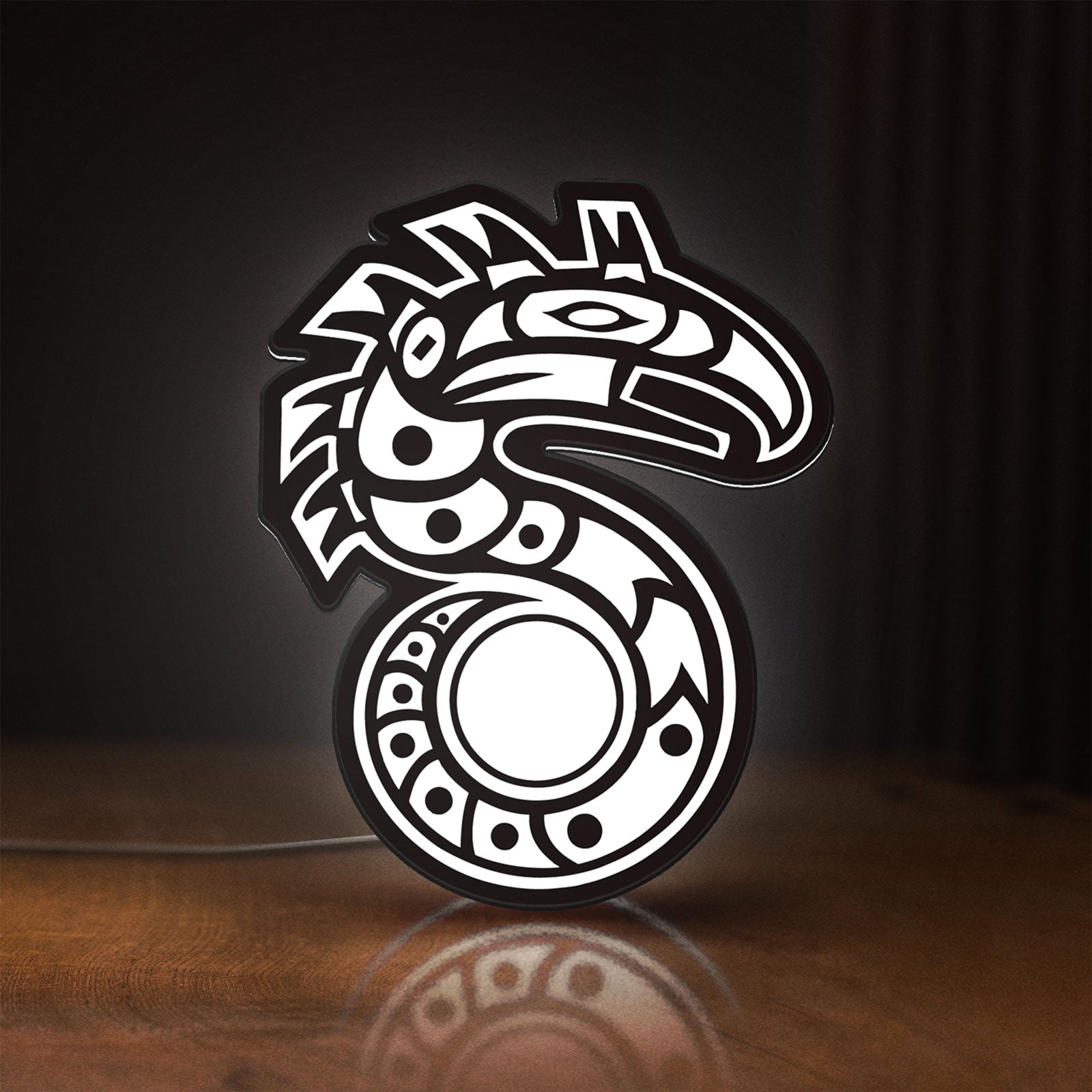 Front view of Shadowrun LED lightbox sign glowing on a wooden desk