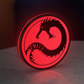 Battletech House Kurita LED lightbox standing on a desk from an angled side view with red glow