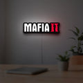 Mafia II LED lightbox hanging on a room wall with soft red light