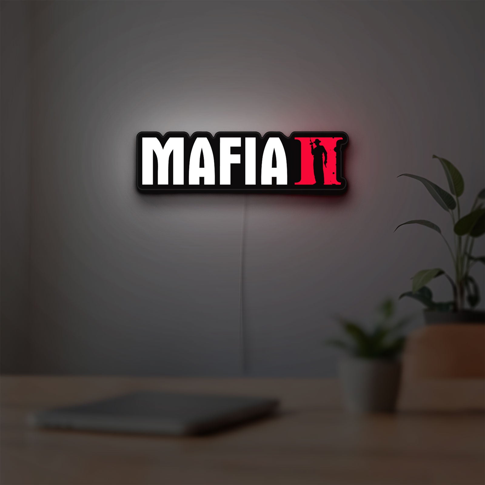 Mafia II LED lightbox hanging on a room wall with soft red light