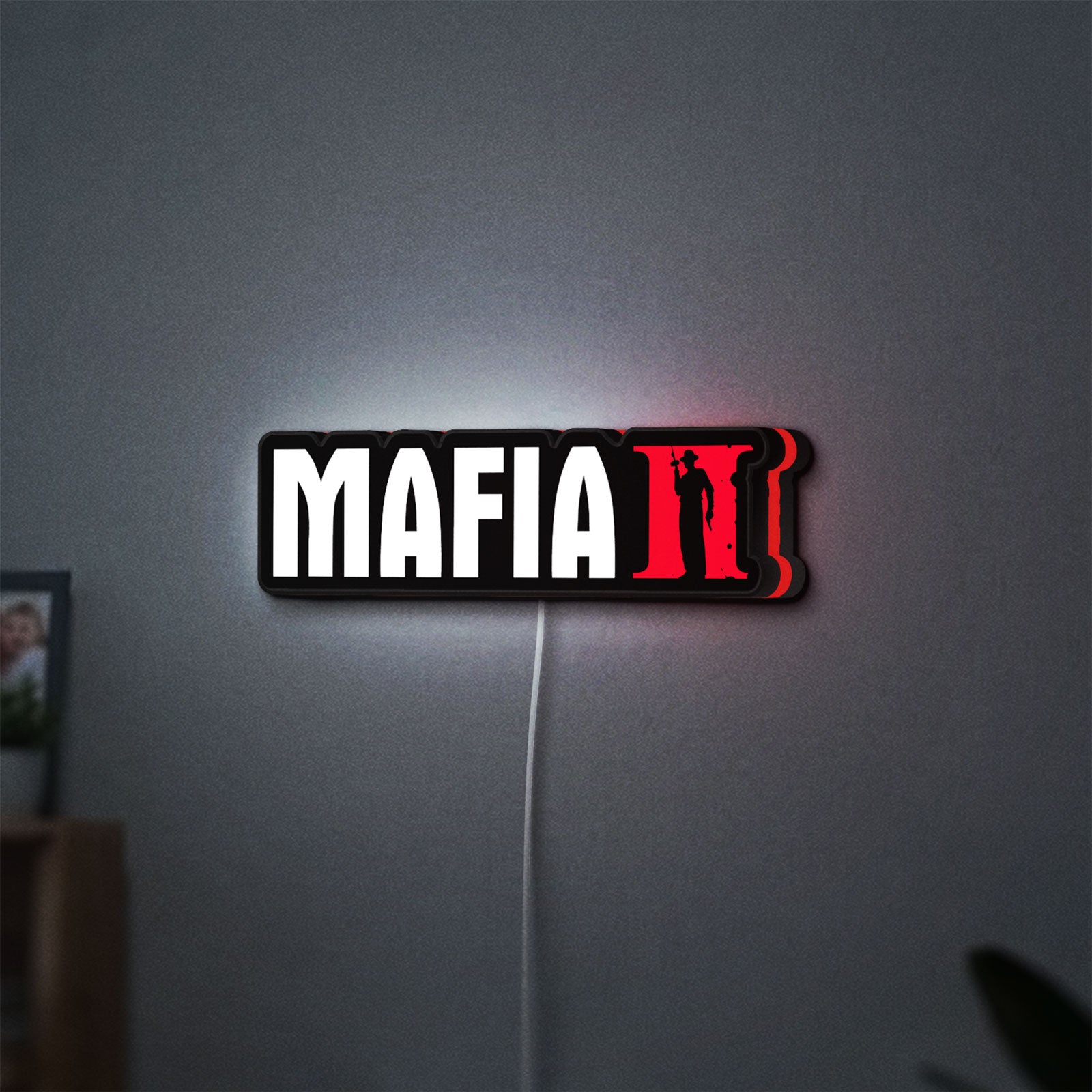 Mafia II LED lightbox hanging on a wall with red glow