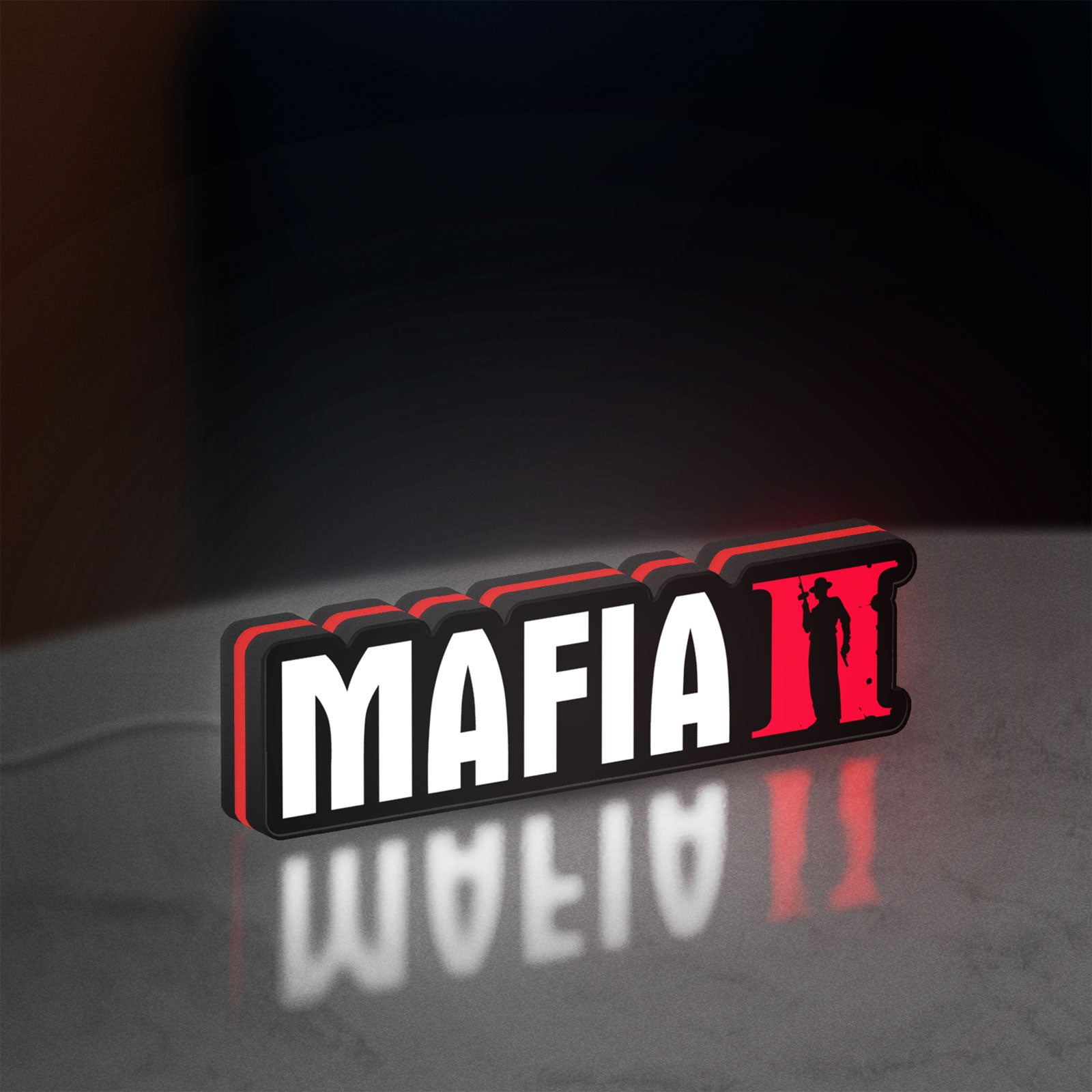 Mafia II LED lightbox standing on a desk from an angled side view with red glow