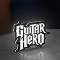 Guitar Hero LED lightbox standing on a desk from an angled side view with white glow