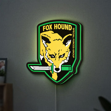 Fox Hound Special Forces LED lightbox hanging on a wall with green glow