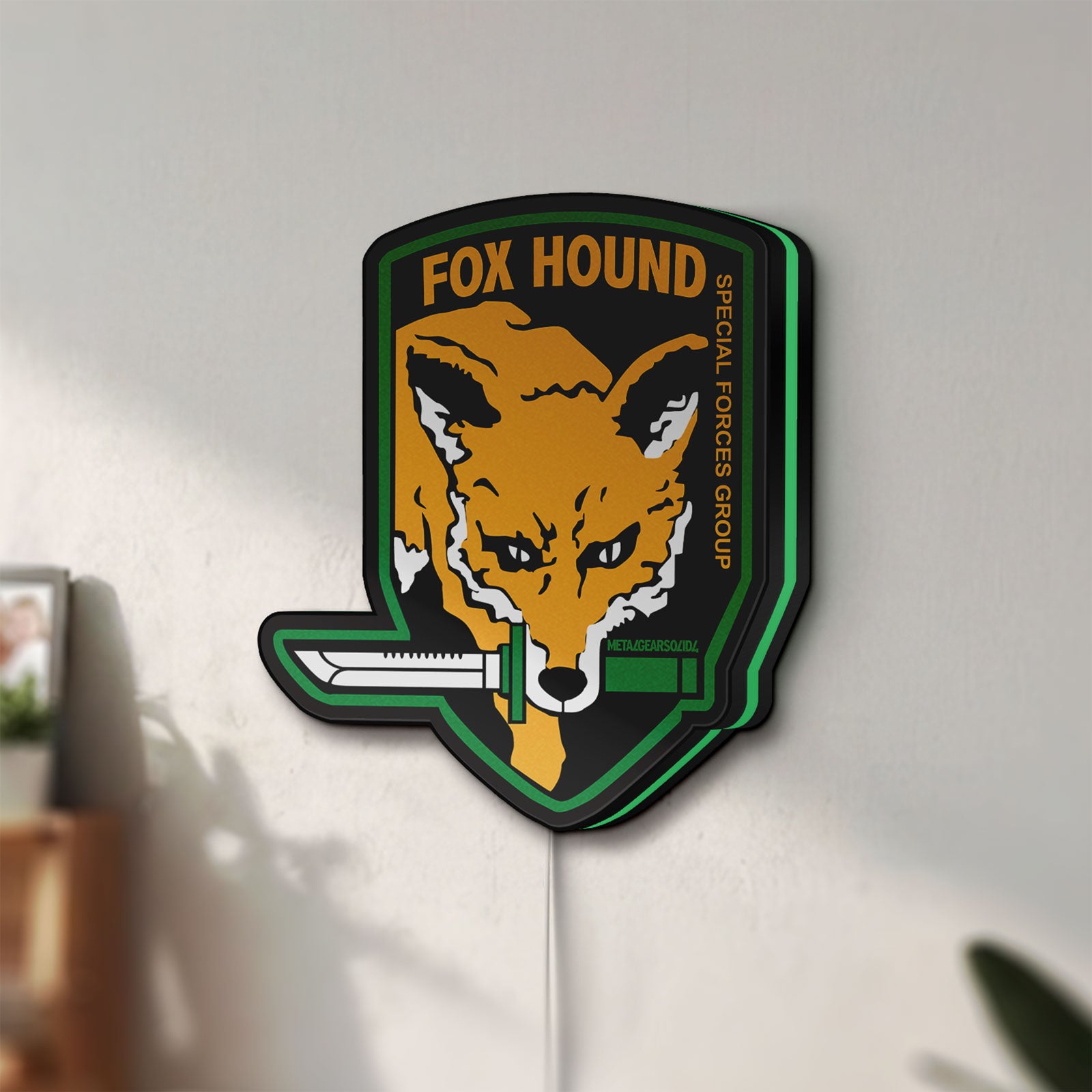 Unlit Fox Hound Special Forces LED lightbox mounted on a wall in daylight