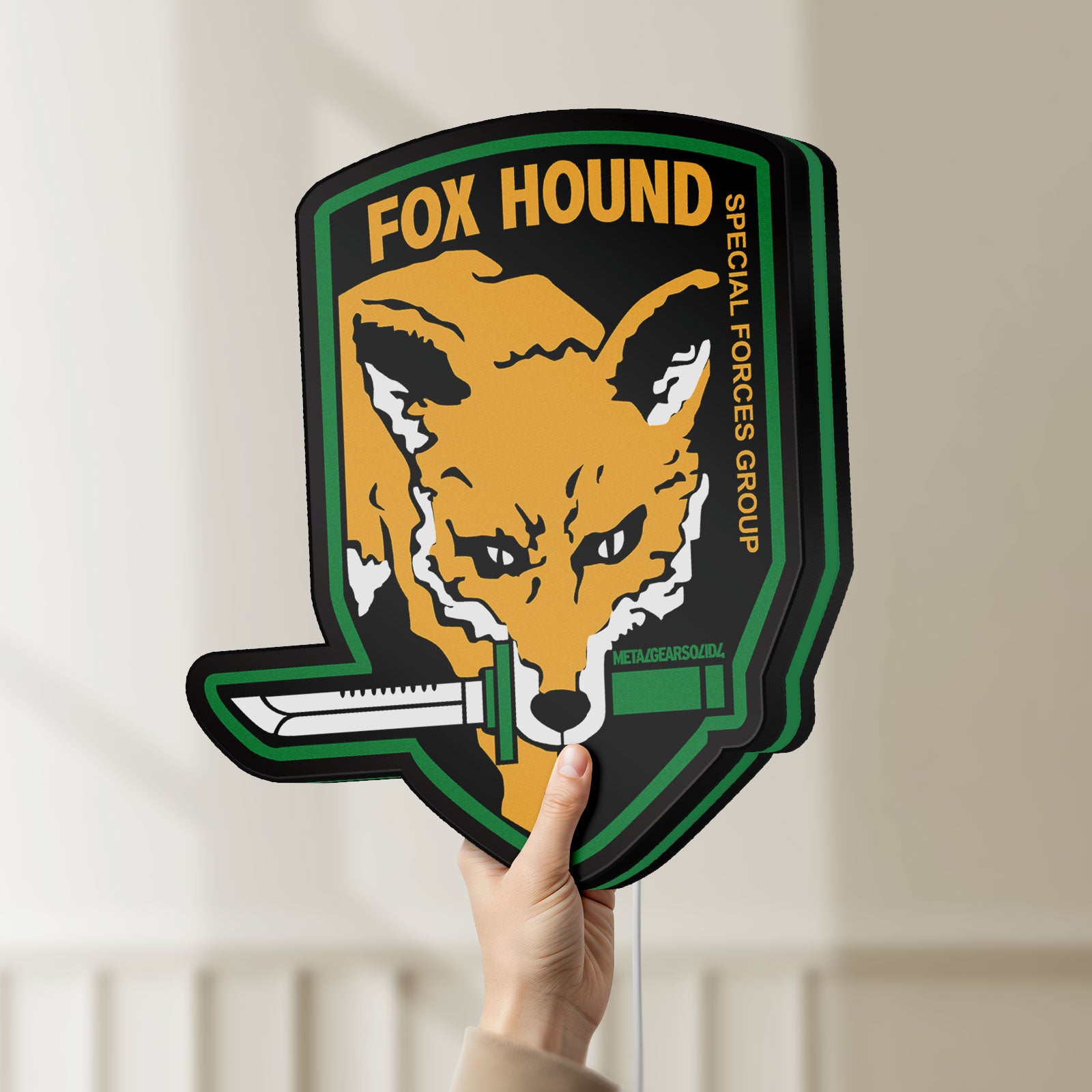 Unlit Fox Hound Special Forces LED lightbox held by hand to show size and details