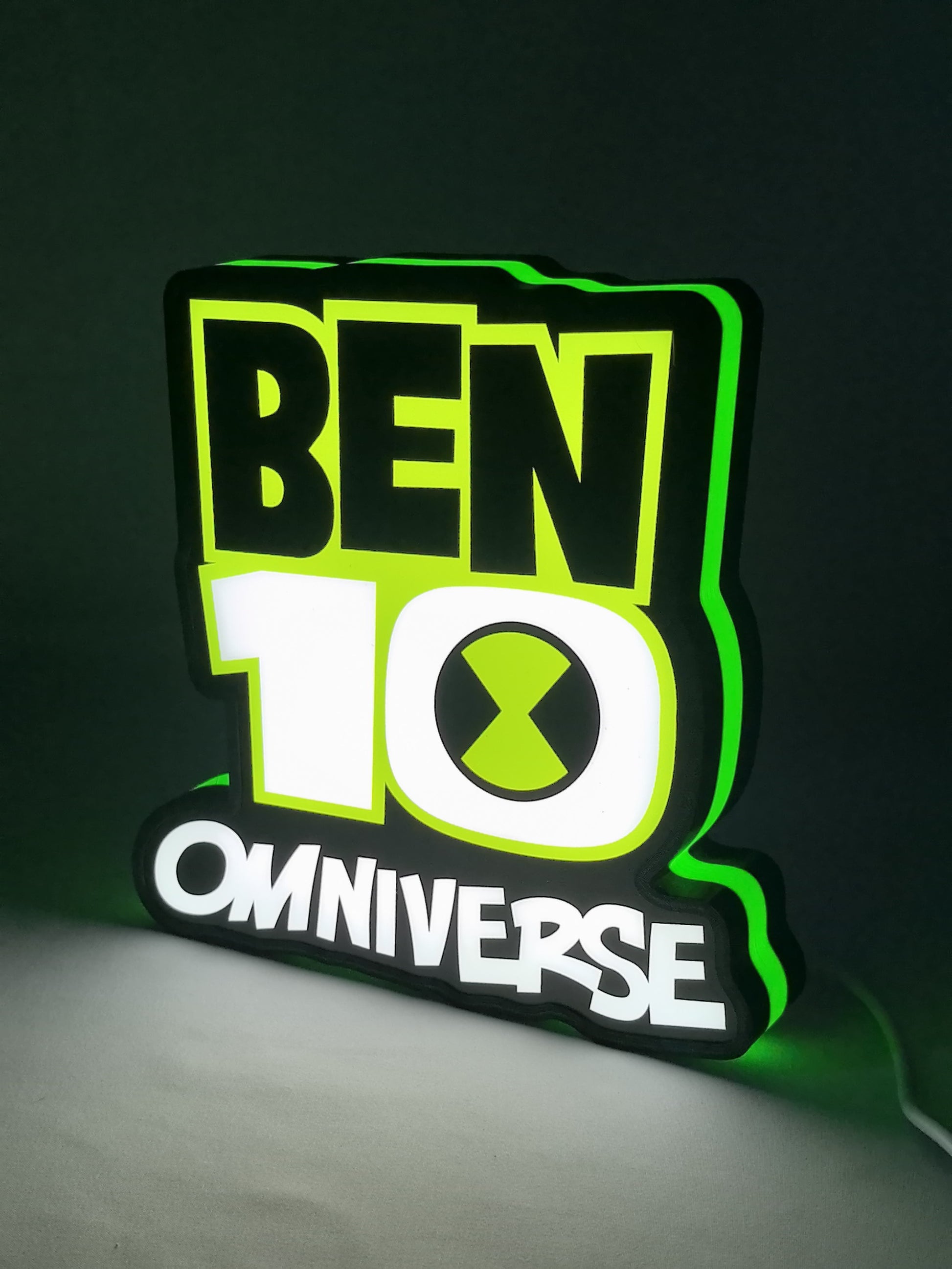 Omniverse 3d led light box 02 lit standing side view of Ben 3D LED Sign in 20cm, unique wall art for desk and room decor