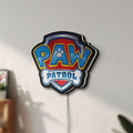 Unlit Paw Patrol LED lightbox mounted on a wall in daylight