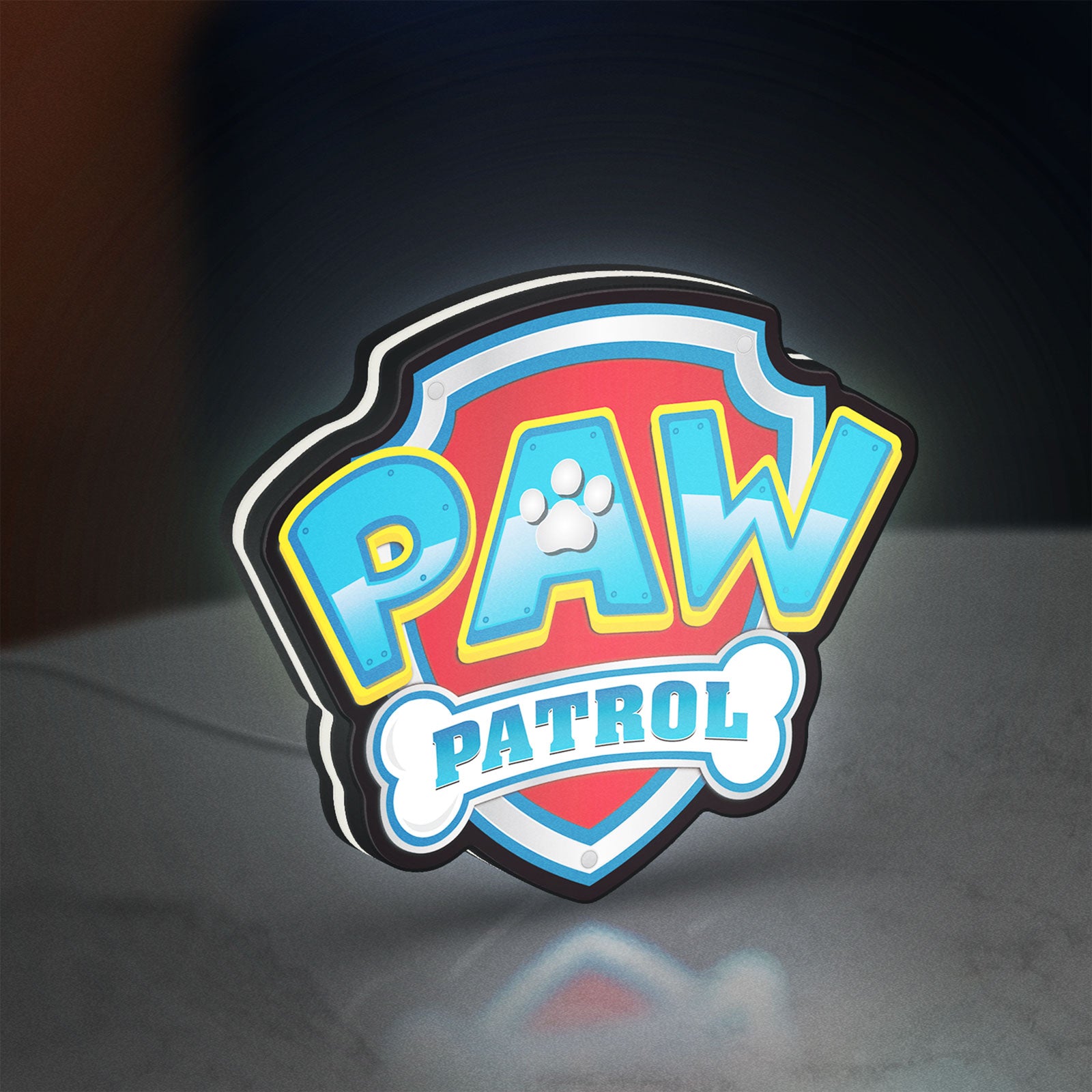 Paw Patrol LED lightbox standing on a desk from an angled side view with white glow