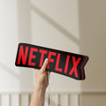 Unlit Netflix Style LED lightbox held by hand to show size and details
